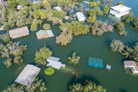 A residential neighborhood experiencing severe flooding