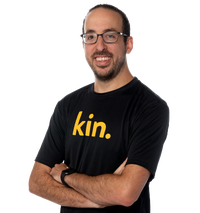 Brian Pogrund Chief Operating Officer and Chief Revenue Officer in a black Kin T-shirt