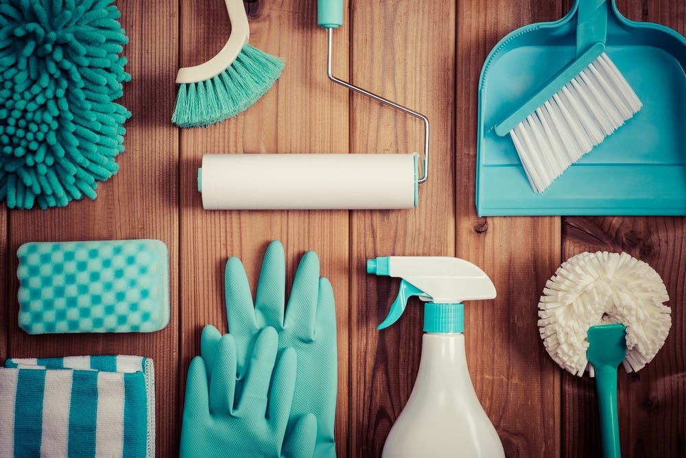 An array of cleaning products and tools