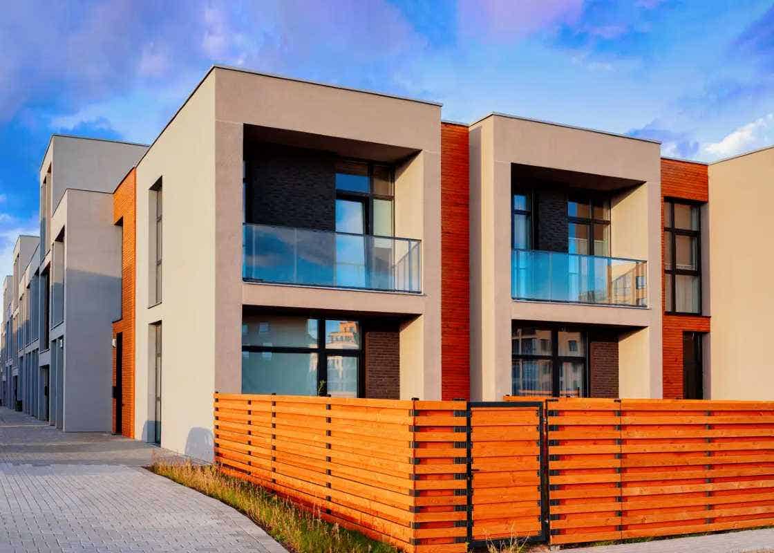 Condos with wooden privacy fences