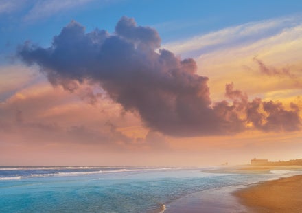 a beach in Duval County at sunrise