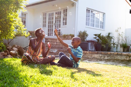 A Florida family in front of their home