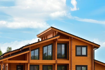A contemporary home against a blue sky