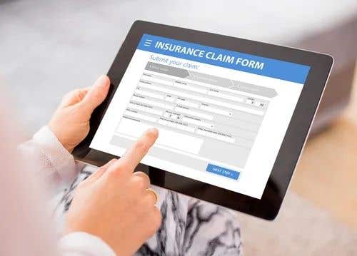 a tablet displaying a insurance claim form