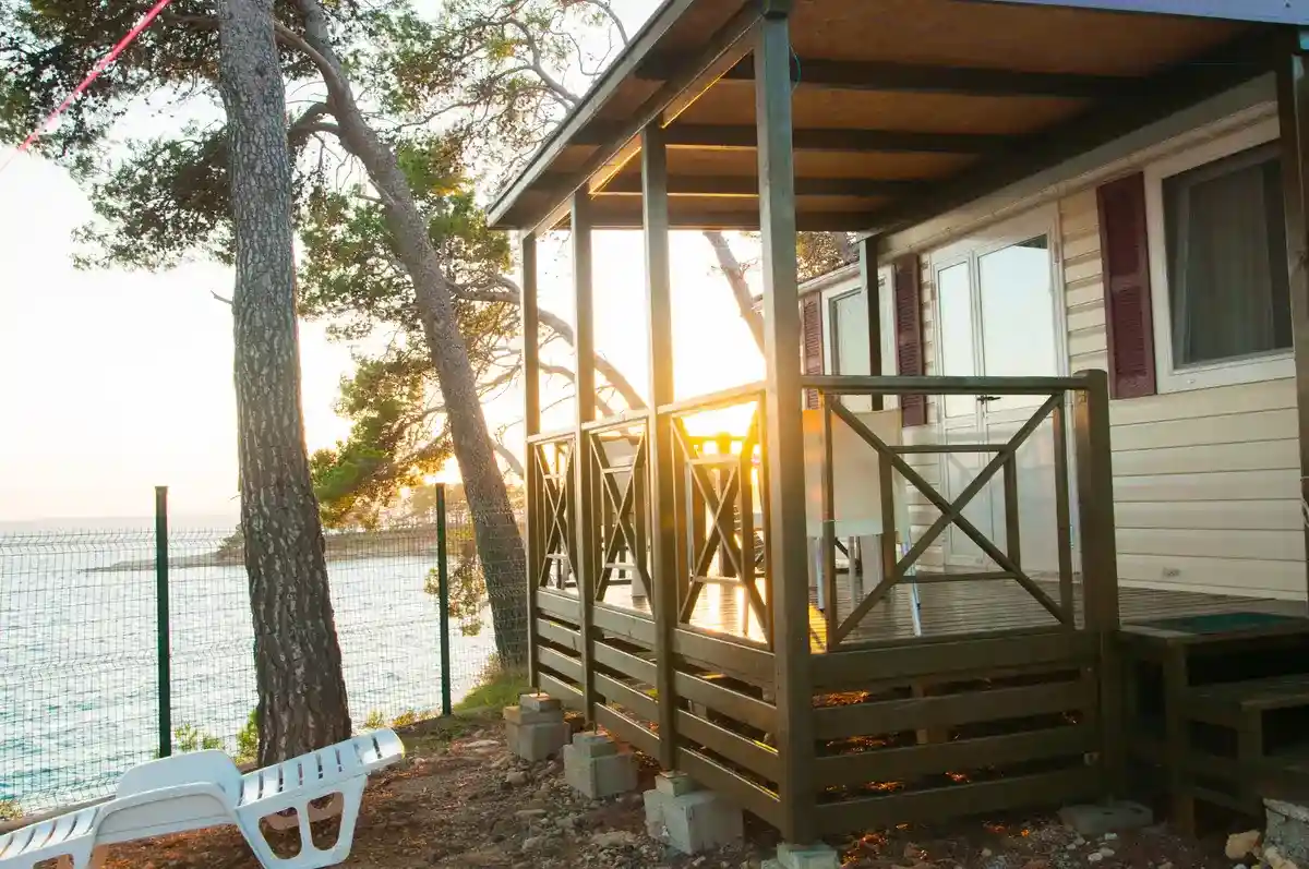 A mobile home on a lake