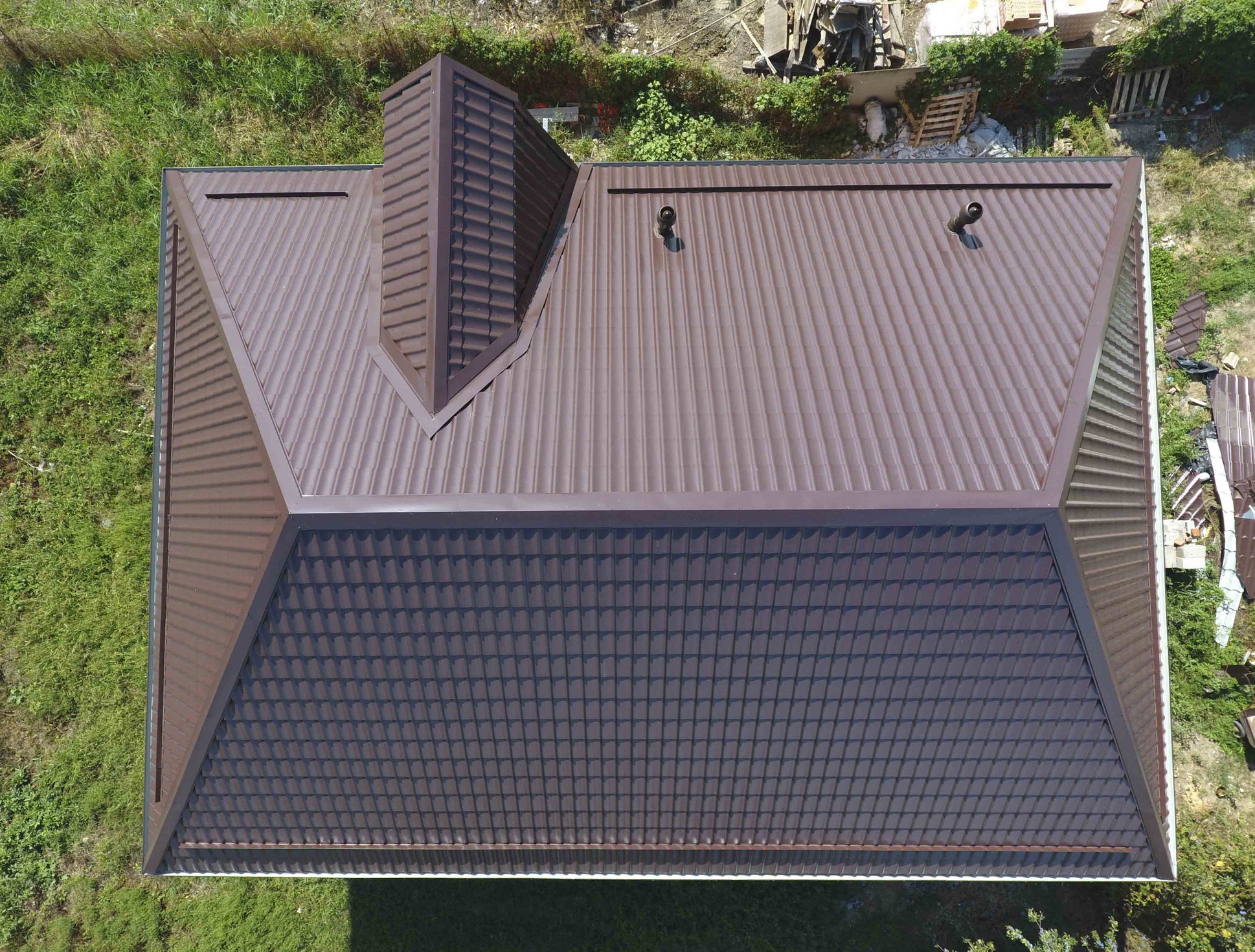 A brown shingle roof viewed from above