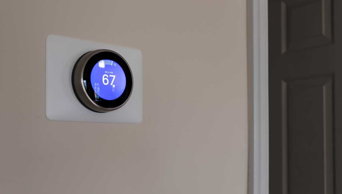 A smart thermostat set at 67 degrees