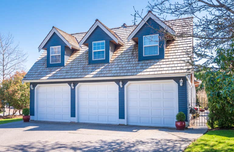 Three-car garage with three dormers