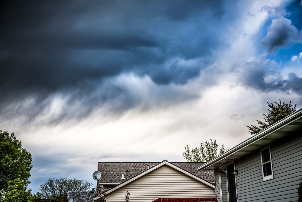 A thunderstorm approaching over a home