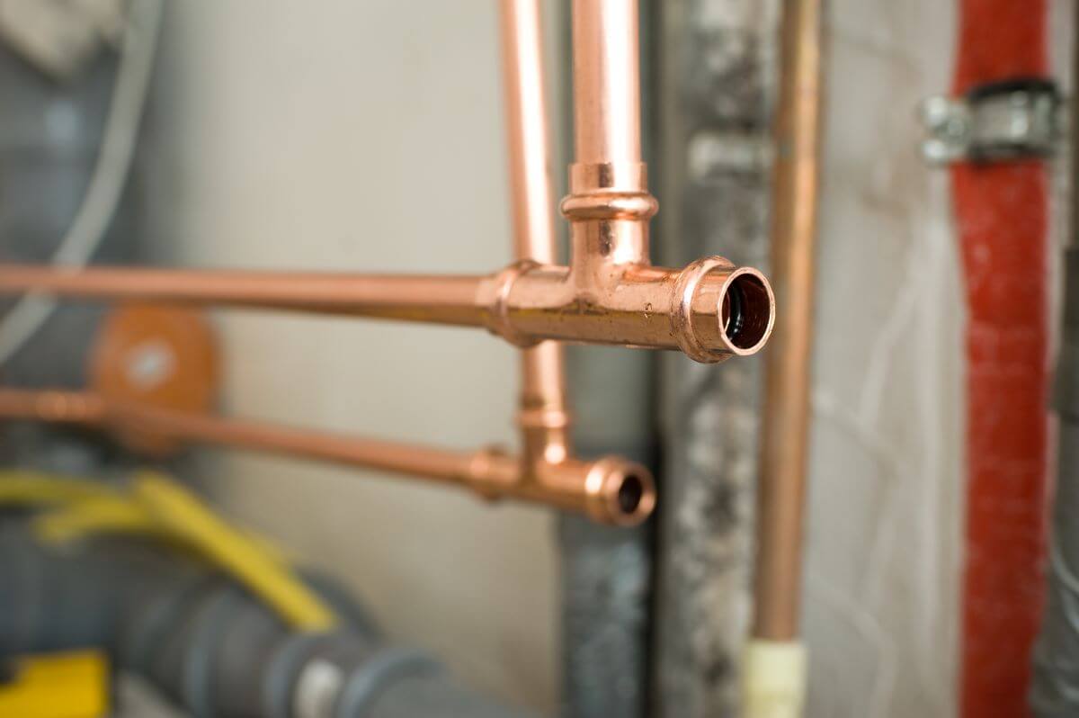 A closeup of thin copper pipes