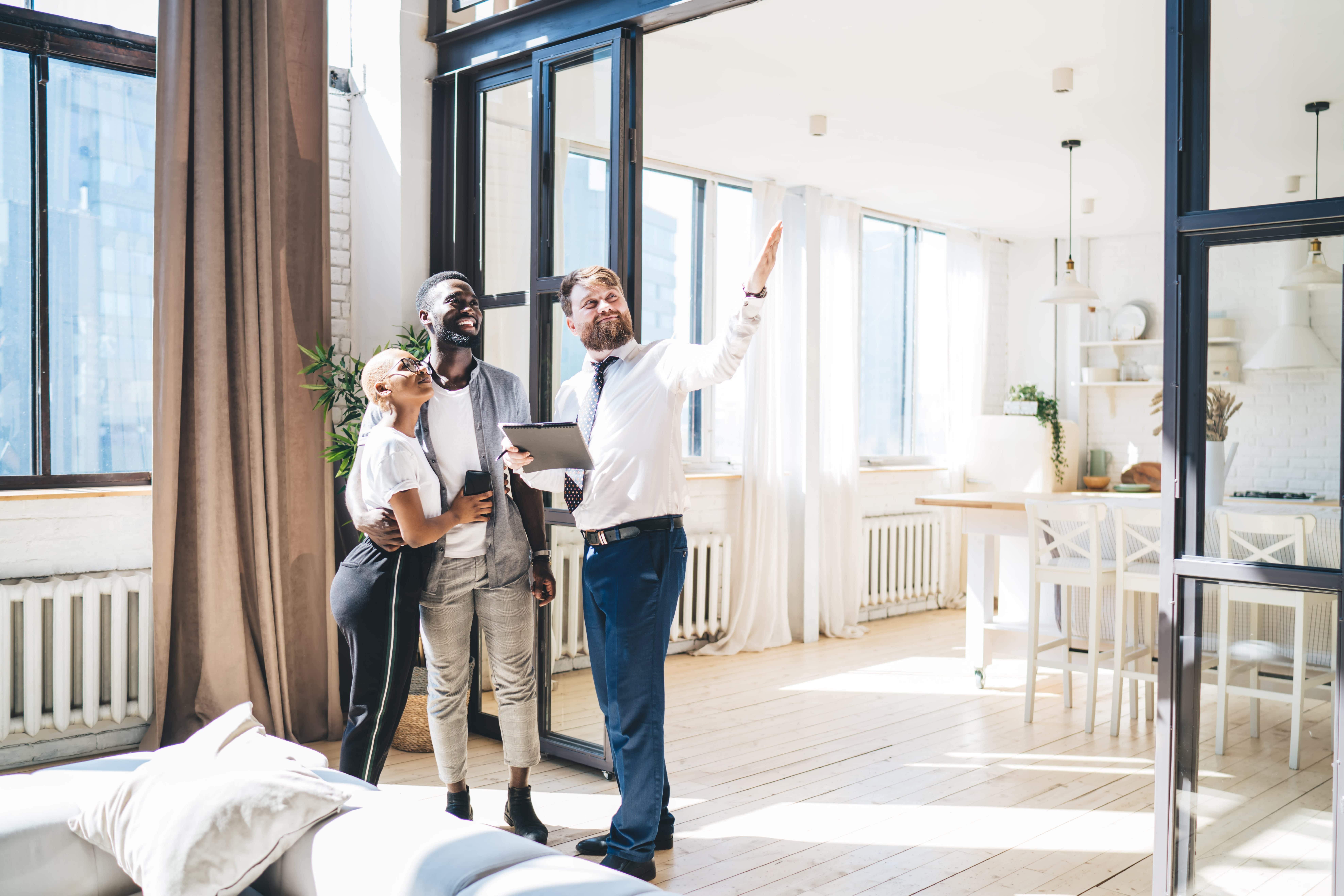 A couple being led through a home inspection