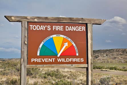 Roadside warning sign labeled indicating very high fire risk